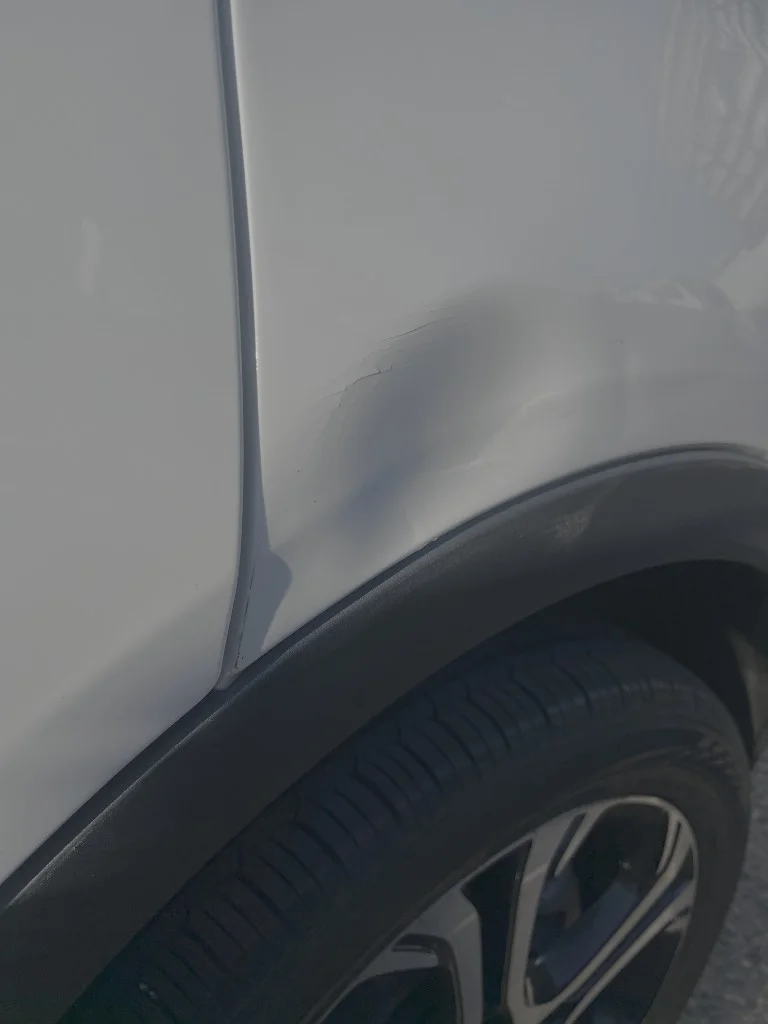 Fender damage — paint cracking