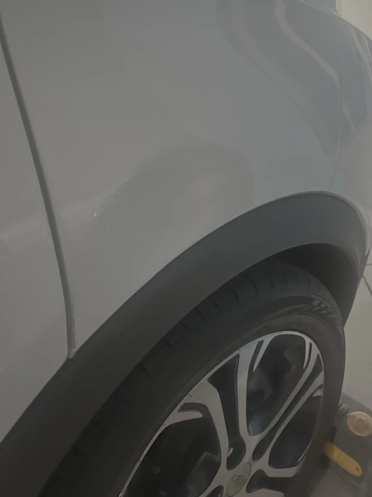 Fender dent — angle view