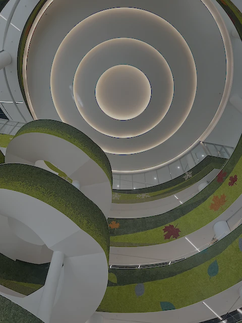 The iconic spiral staircase and circular ceiling design of Gyeonggi Library