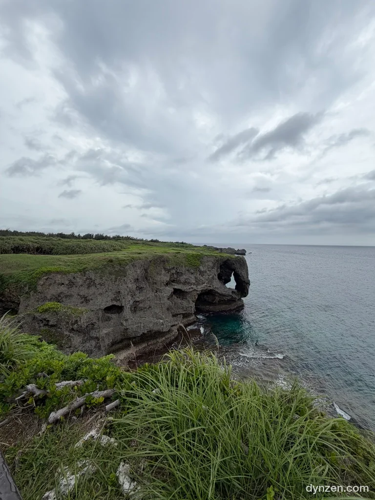 Cape Manzamo’s elephant rock formation under a cloudy sky