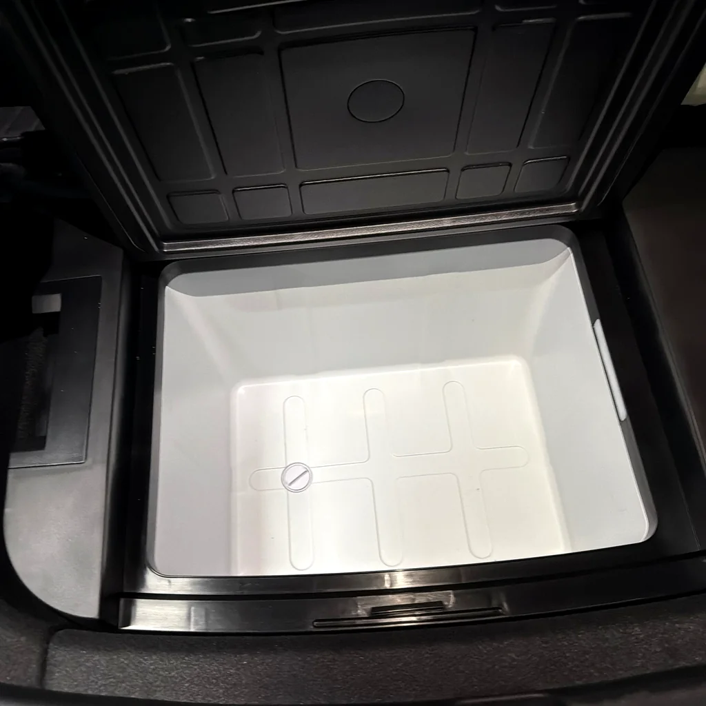 Alpicool TSL35 fridge fitted into the Model Y’s under-trunk compartment