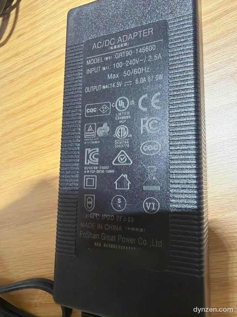 TSL35 bundled AC/DC adapter label showing 100-240V input